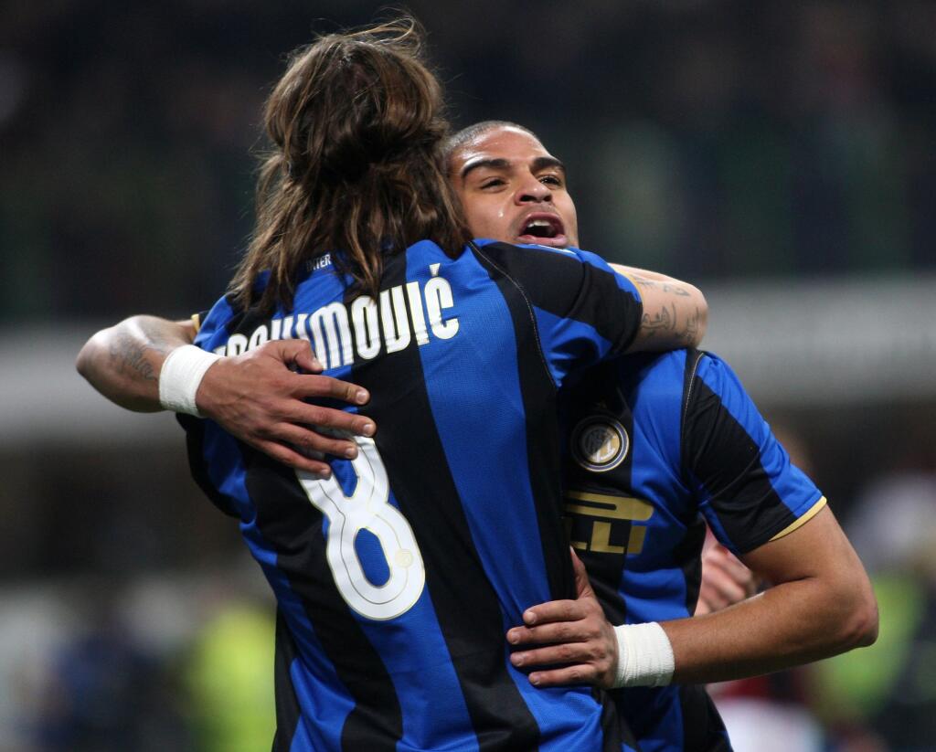 MILAN, ITALY - FEBRUARY 15: Adriano of Inter Milan is congratulated by Zlatan Ibrahimovic (L) of Inter Milan after scoring the first goal during the Serie A match between Inter and Milan at the Meazza Stadio on February 15, 2009 in Milan, Italy. (Photo by New Press/Getty Images)
