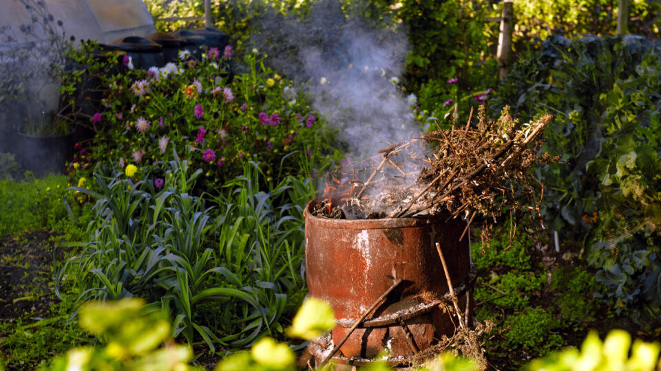 Burning,Leaves,,Fire,While,Cleaning,The,Garden,In,Early,Autumn,