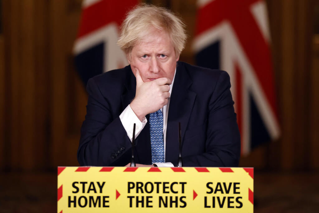 Boris Johnson počas tlačovej konferencie v Londýne vo štvrtok 7. januára 2020

 

Britain's Prime Minister Boris Johnson speaks during a media briefing on coronavirus, COVID-19, in Downing Street, London, Thursday Jan. 7, 2021. (Tolga Akmen/Pool via AP)