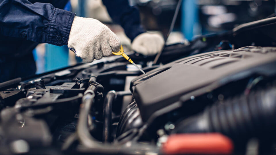Auto,Car,Repair,Service,Center.,Mechanic,Checking,Engine,Oil,Level