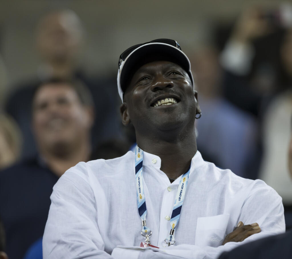 NEW YORK, NY - AUGUST 26: Michael Jordan attends 1st round match between Roger Federer of Switzerland and Marinko Matosevic of Australia at US Open tournament in Flushing Meadows USTA Tennis Center