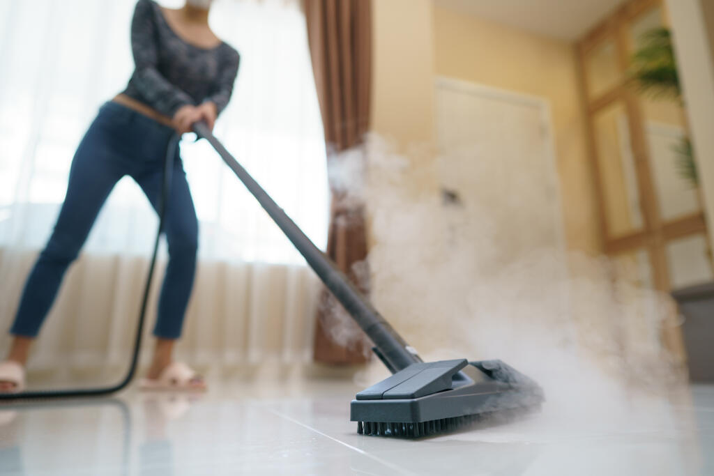 Woman,Washes,The,Floor,With,A,Steam,Mop.