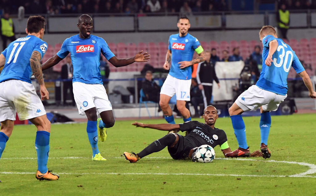 Manchester City's Fernandinho reaches for the ball during the Champions League Group F soccer match between Napoli and Manchester City, at the San Paolo stadium in Naples, Italy, Wednesday, Nov. 1, 2017. (Ciro Fusco/ANSA via AP)