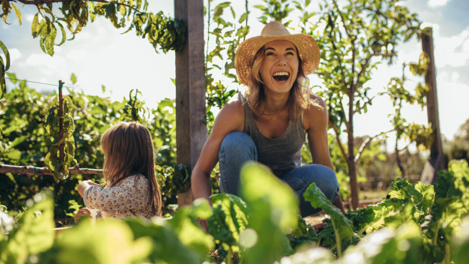 Beautiful,Young,Female,Farmer,Working,In,Her,Garden,With,Her