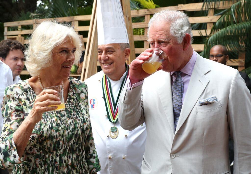 HAVANA, CUBA - MARCH 27: Camilla, Duchess of Cornwall and Prince Charles, Prince of Wales enjoy a glass of Havana Club with President of the Cuban Culinary Association Eddy Fernandez (C) during a visit to a paladar called Habanera, a privately owned restaurant on March 27, 2019 in Havana, Cuba. Their Royal Highnesses have made history by becoming the first members of the royal family to visit Cuba in an official capacity. (Photo by Chris Jackson - Pool/Getty Images)