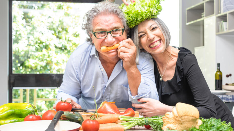 Senior,Couple,Having,Fun,In,Kitchen,With,Healthy,Food,-