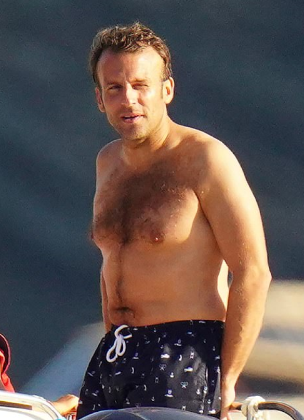 Macron shirtless