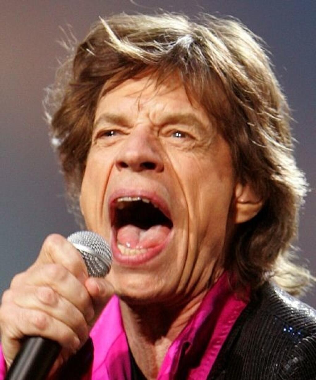 ** JAGGER ** Mick Jagger sings on stage as The Rolling Stones perform during their concert at Saitama Super Arena in Saitama, north of Tokyo, Sunday, April 2, 2006. The rock 'n' roll band is on a five-concert tour to Japan as part of