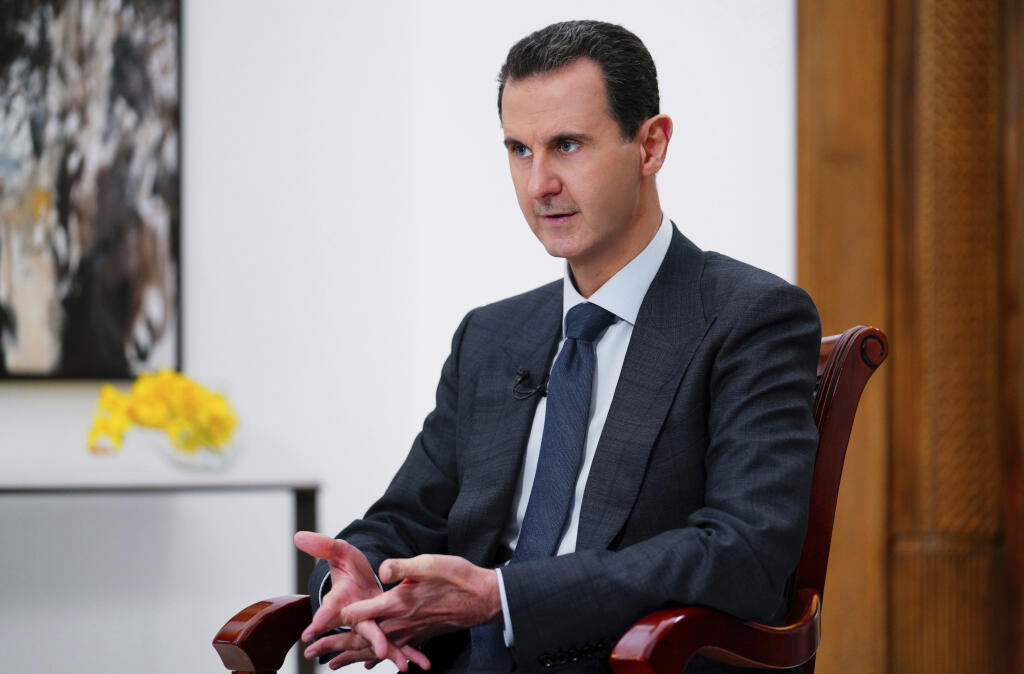 WA 5 archív Damask - Na archívnej snímke z 9. novembra 2019 sýrsky prezident Bašár Asad reční v Damasku. Sýrsky prezident Bašár Asad odvolal vo štvrtok 11. júna 2020 z funkcie premiéra Imáda Chamísa. Informovala o tom agentúra AFP s odvolaním sa na vyhlásenie kancelárie prezidenta.  Podľa AFP je dôvodom Chamísovho odvolania hlboká ekonomická kríza, v ktorej sa Sýria nachádza. FOTO TASR/AP

FILE - In this file photo released Monday Nov. 9, 2019 by the Syrian official news agency SANA, Syrian Pres