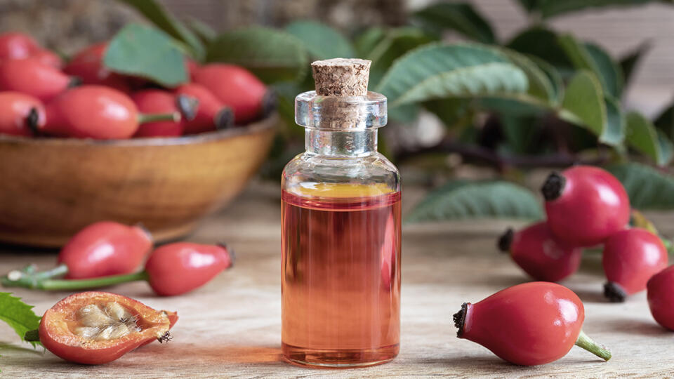 A,Bottle,Of,Rosehip,Seed,Oil,With,Fresh,Plant