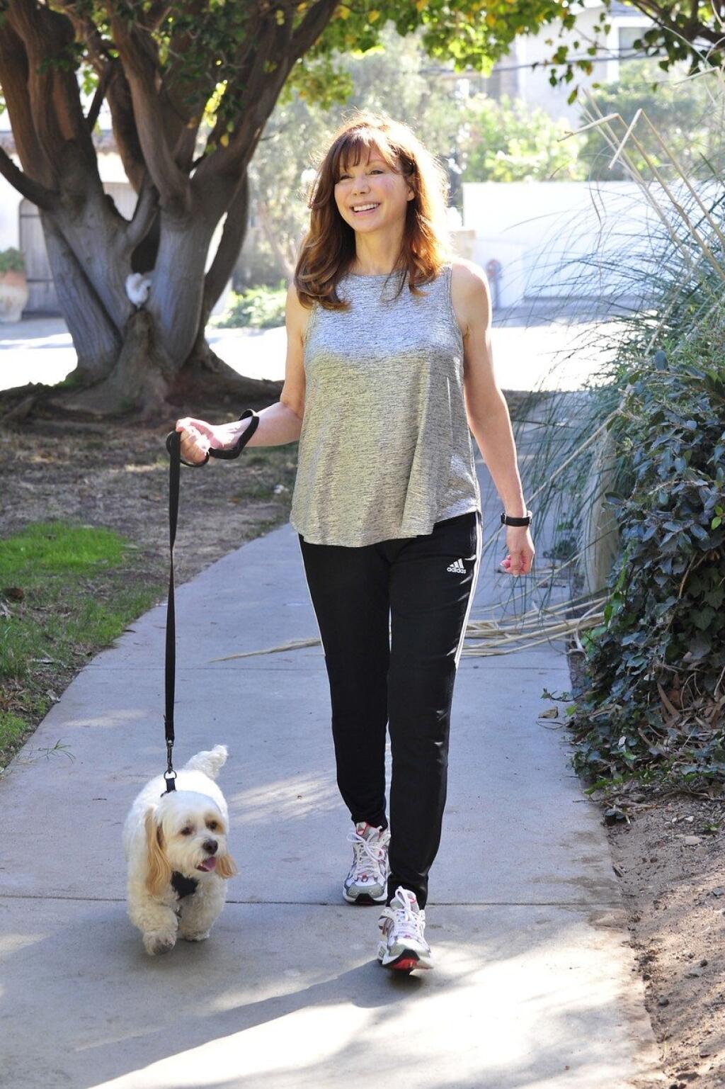 Exclusive - Malibu, CA - 12/04/2017 - Victoria Principal walking her dog in Malibu. When we asked her his name, she said he was her rescue dog `Milo.` -PICTURED: Victoria Principal with dog Milo -, Image: 357021106, License: Rights-managed, Restrictions: Exclusive, Model Release: no, Credit line: Profimedia, INSTAR Images