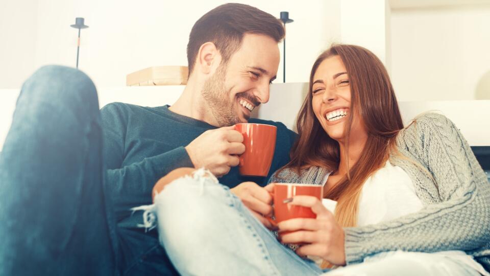Happy young couple at home