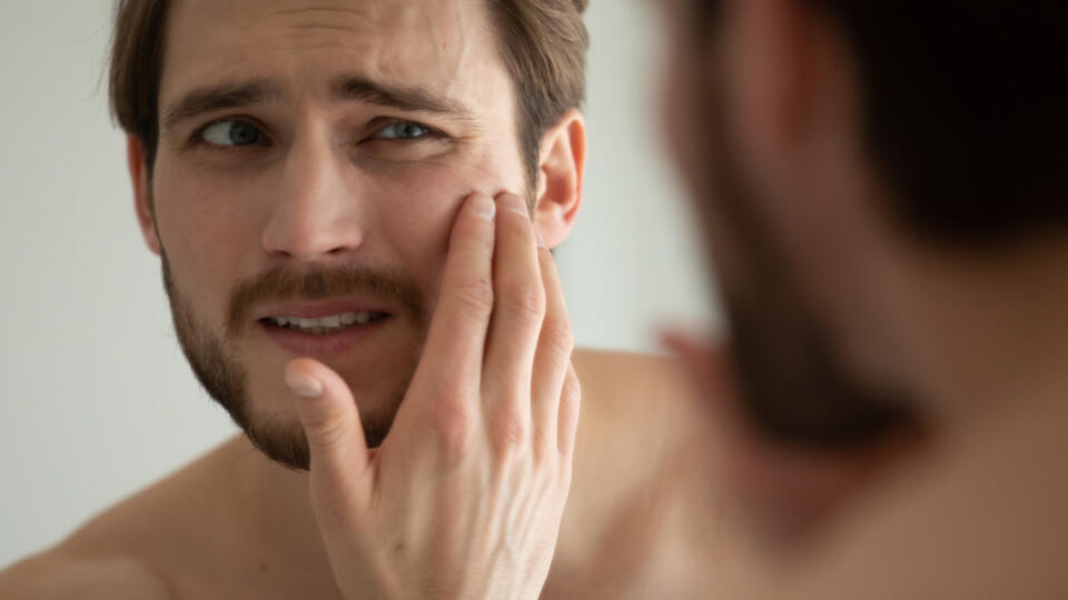 Close,Up,Head,Shot,Unhappy,Man,Looking,In,Mirror,,Feeling