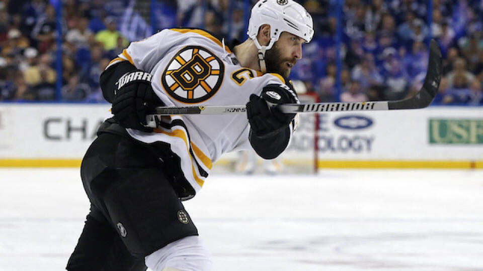 Boston Bruins' Zdeno Chara follows through on a goal during the third period of an NHL hockey game against the Tampa Bay Lightning, Sunday, March 22, 2015, in Tampa, Fla. The Lightning won 5-3. (AP Photo/Mike Carlson)