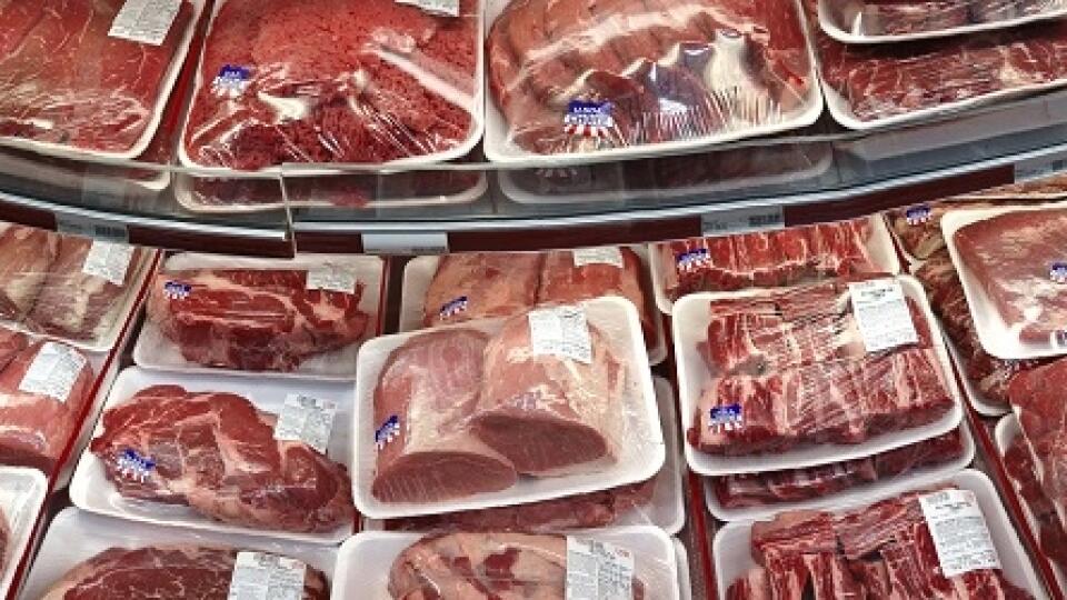 FILE - In this Nov. 2, 2013 file photo, various cuts of beef and pork are displayed for sale in the meat department at a discount market in Arlington, Va. Every five years, the government tells Americans how to eat healthier. Whether individuals listen or not, the dietary guidelines affect nutritional patterns throughout the country _ from federally-subsidized school lunches to labels on food packages to your doctor's advice. A government advisory committee is set to issue preliminary recommend