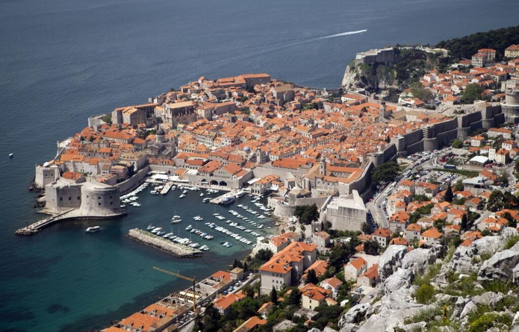 WITH STORY CROATIA GOLF REFERENDUM - Dubrovnik old town is pictured from Srdj, the hill above the city, Friday, April 26, 2013. The residents of this scenic Croatian Adriatic sea resort will decide hold a referendum on Sunday April 28, 2013, whether to allow the 1.1-billion euros ($1.4 billion) golf park development project on the hill above the city that many claim endangers their ancient city, often dubbed the Pearl of the Adriatic, and the outcome could have serious consequences on the future
