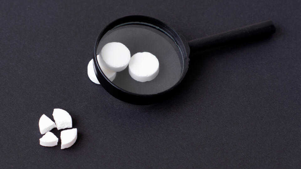 Medical,Pills,And,Capsules.,Isolated,On,A,Black,Background.,A