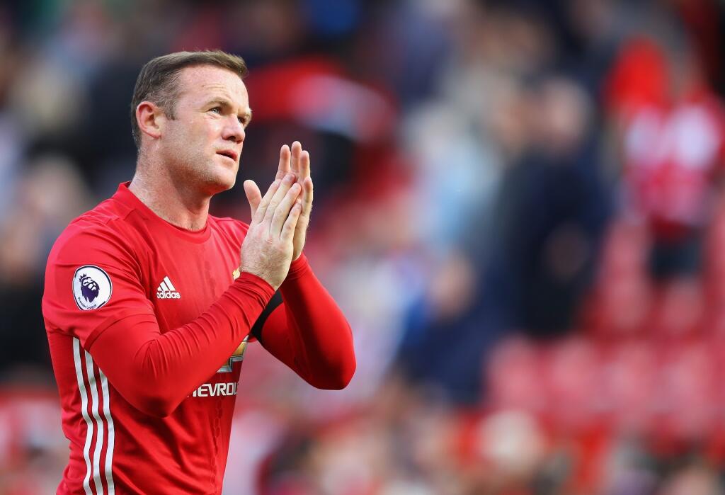 MANCHESTER, ENGLAND - OCTOBER 02: Wayne Rooney of Manchester United shows apperciation to the fans after the game during the Premier League match between Manchester United and Stoke City at Old Trafford on October 2, 2016 in Manchester, England. (Photo by Richard Heathcote/Getty Images)