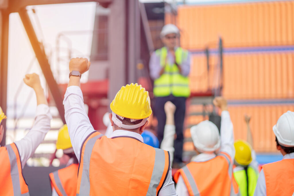 Teamwork,Engineer,Technician,And,Foreman,And,Safety,Helmet,In,Cargo