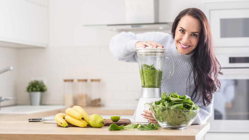 Green,Blend,Of,Smoothie,Made,By,A,Woman,On,Healthy