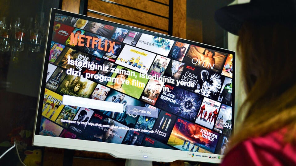 A woman looks at the login screen of online streaming service Netflix in Ankara, Turkey on February 5, 2018 as an omnibus bill introduced to the parliament, allows the Radio and Television Supreme Council (RTUK) to monitor and censor online streaming services, including Netflix, Spotify and Youtube. (Photo by Altan Gocher/NurPhoto via Getty Images)