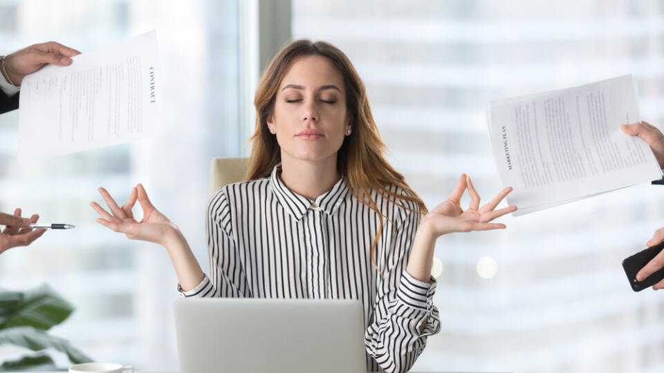 Calm,Female,Executive,Meditating,Taking,Break,At,Work,For,Mental