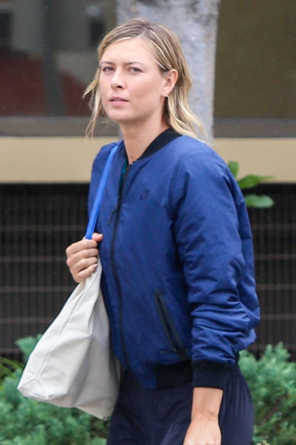Brentwood, CA - Maria Sharapova is seen leaving a workout on a rainy day in Brentwood. The blonde tennis player is wearing leggings and a Nike bomber paired with bright Nike sneakers. January 10, 2017, Image: 310492162, License: Rights-managed, Restrictions: , Model Release: no, Credit line: Profimedia, AKM-GSI