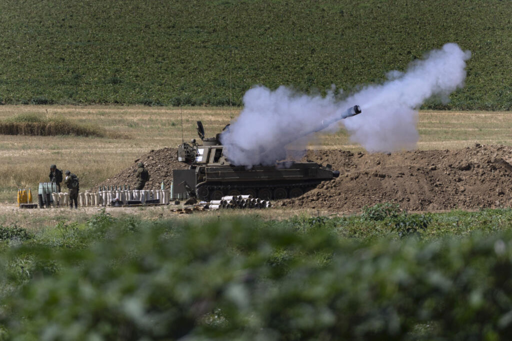 JB 27 Gaza - Izraelské delostrelectvo páli na ciele v pásme Gazy na hraniciach Izraela s Gazou 18. mája 2021. FOTO TASR/AP

An Israeli artillery unit fires toward targets in Gaza Strip, at the Israeli Gaza border, Tuesday, May 18, 2021. (AP Photo/Tsafrir Abayov)