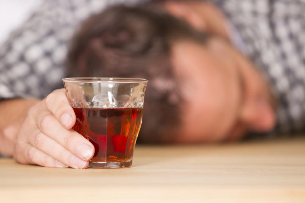 Young,Man,Feeling,Alone,And,Drinking,Too,Much,Alcohol,In