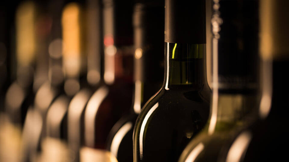 Row,Of,Vintage,Wine,Bottles,In,A,Wine,Cellar,(shallow
