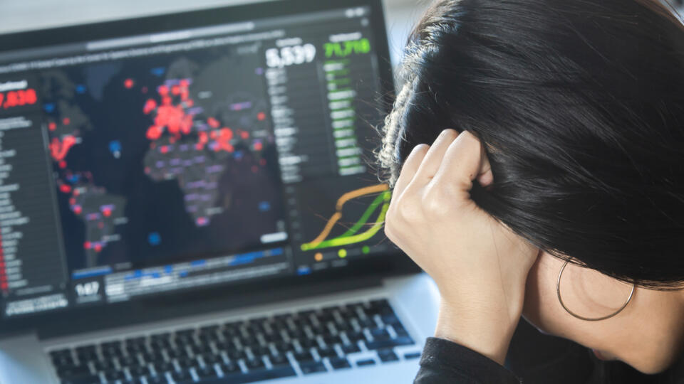 A woman reading news/updates about coronavirus and getting anxiety/depression