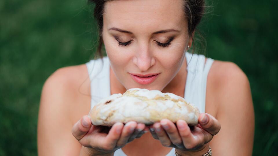 pregnant yoga prenatal maternity with  freshly baked homemade bread in