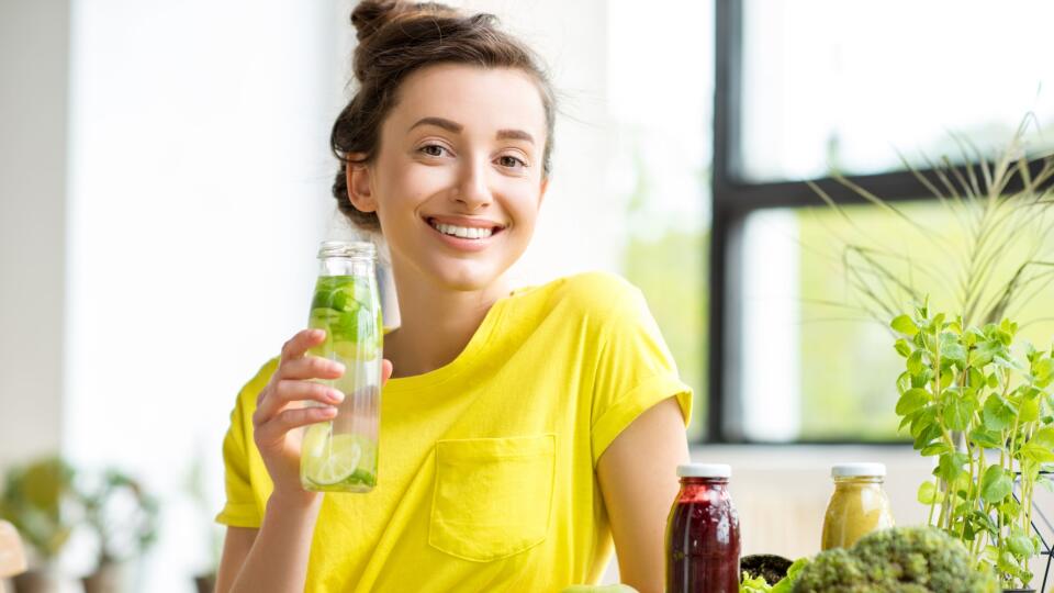 Woman with healthy food indoors