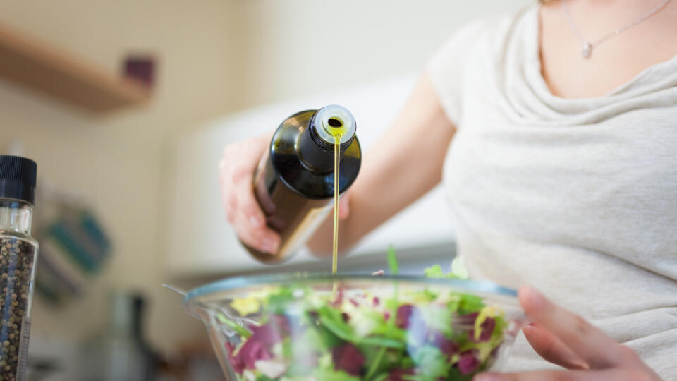 Woman,Preparing,A,Salad