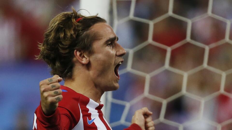 Atletico Madrid's Antoine Griezmann celebrates scoring their first goal