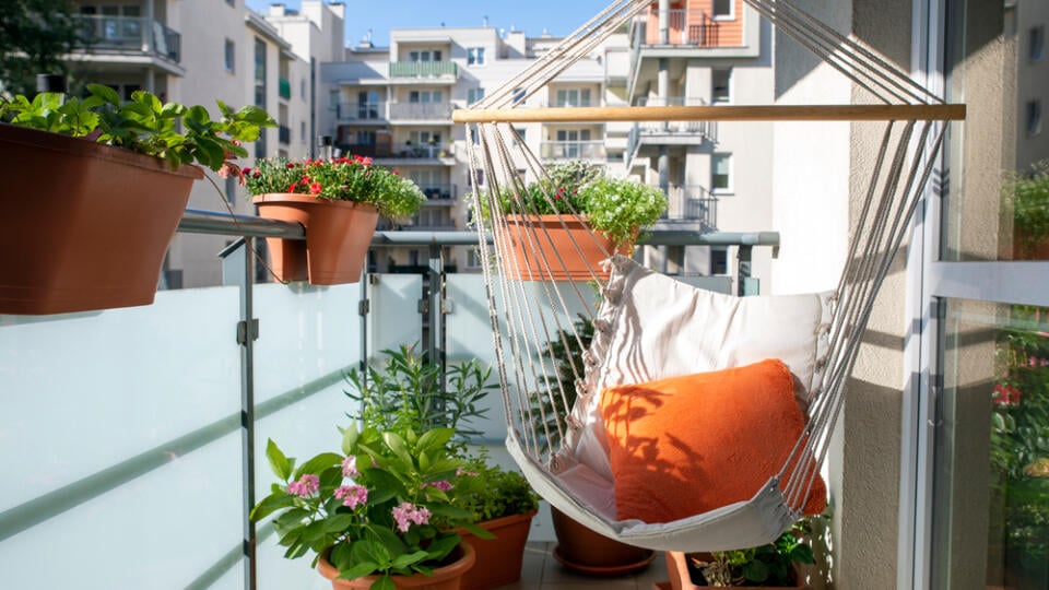 Summer,Balcony,With,Hammock,And,Flowering,Plants