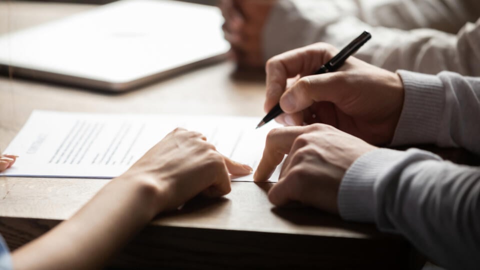 Solicitor,Pointing,At,Insurance,Contract,Showing,Male,Client,Where,To