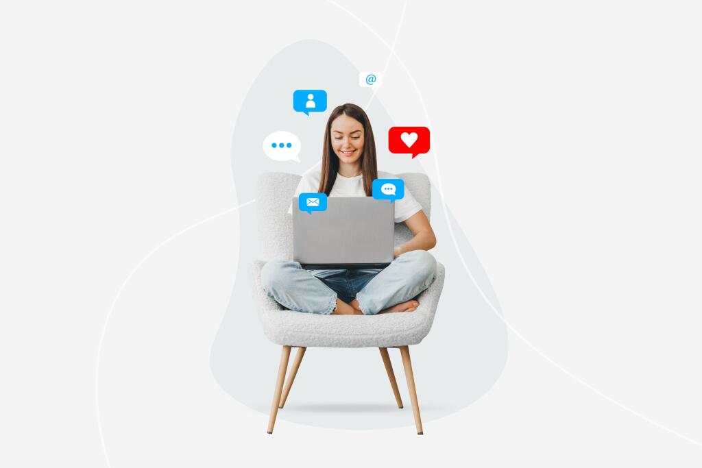 Girl,Sitting,On,A,Chair,With,A,Laptop,With,Social