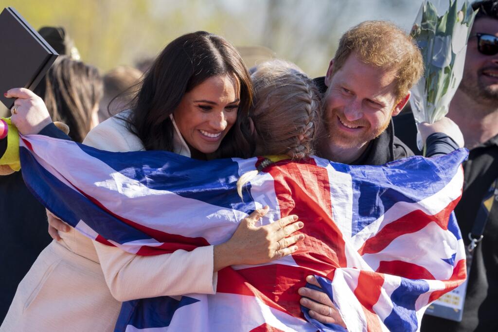 Princ Harry a jeho manželka Meghan Markle v holandskom Haagu.