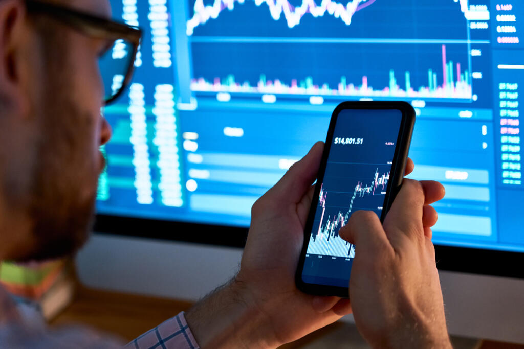 Business,Man,Trader,Investor,Analyst,Using,Mobile,Phone,App,Analytics