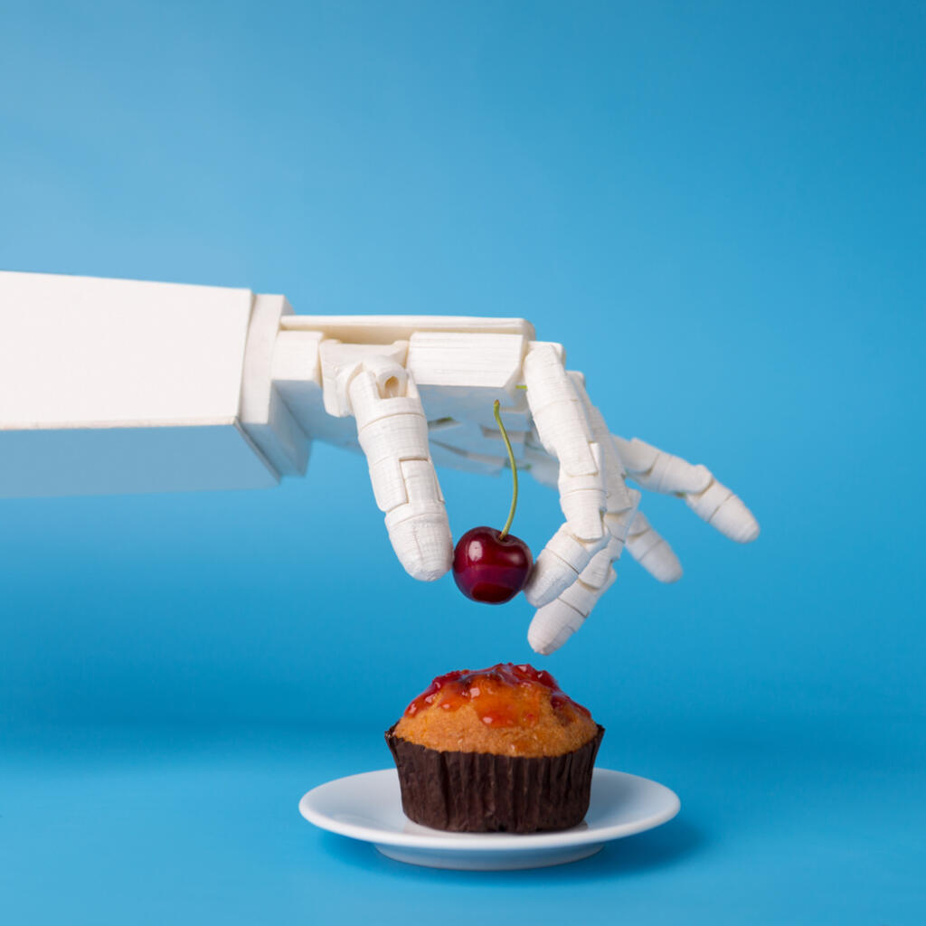 Chef,Robotic,Assistant,In,Kitchen,Technology.,Robot,Hand,Decorating,Sweet
