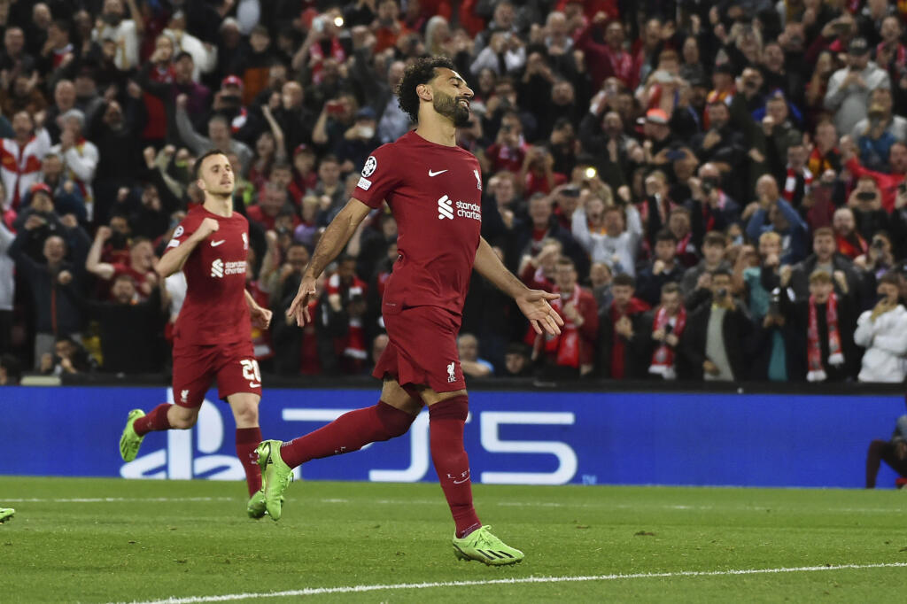 WA 9 Liverpool - Futbalista Liverpoolu Mohamed Salah sa teší po strelení gólu na 2:0 zo značky pokutového kopu v zápase 3. kola A-skupiny Ligy majstrov FC Liverpool - Glasgow Rangers v Liverpoole 4. októbra 2022. FOTO TASR/AP
Liverpool's Mohamed Salah celebrates after scoring his side's second goal from a penalty shot during the Champions League Group A soccer match between Liverpool and Rangers at Anfield stadium in Liverpool, England, Tuesday Oct. 4, 2022. (AP Photo/Rui Vieira)