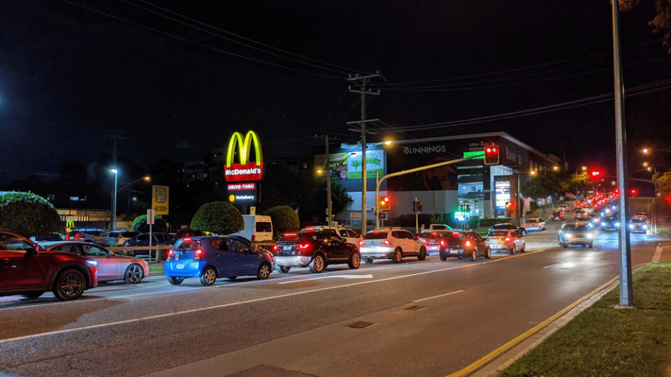 View,Of,Mcdonald's,Drive,Through,Signboard,And,Traffic,In,Indooroopilly,