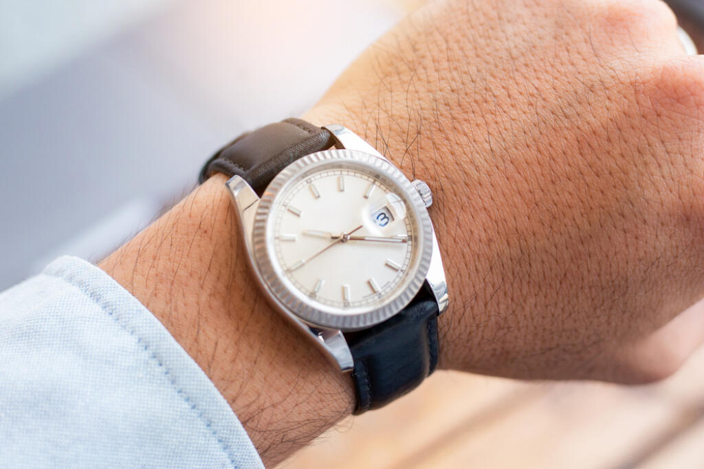 Fashionable,Wearing,Stylish,Looking,At,Luxury,Watch,On,Hand,Check
