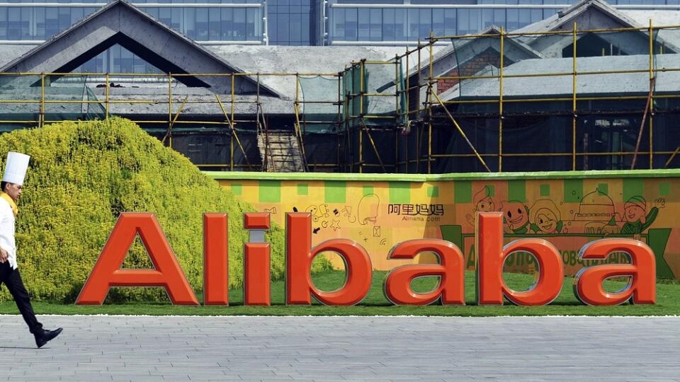 FILE - In this Aug. 27, 2014 file photo, a chef walks in the headquarter campus of Alibaba Group in Hangzhou in eastern China's Zhejiang province. Alibaba Group Holding Ltd. reports quarterly financial results before the market opens on Tuesday, Oct. 27, 2015. (Chinatopix via AP, File) CHINA OUT