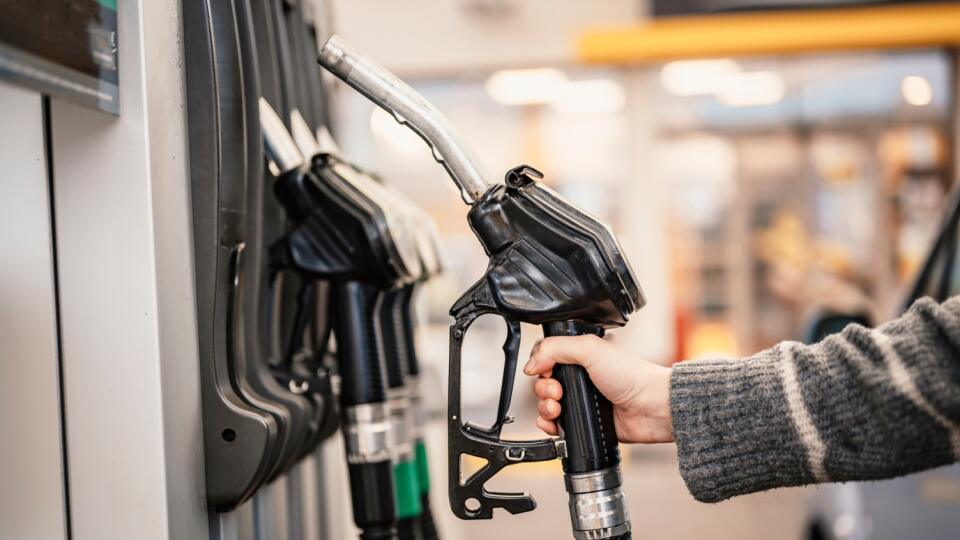 Closeup,Of,Woman,Pumping,Gasoline,Fuel,In,Car,At,Gas