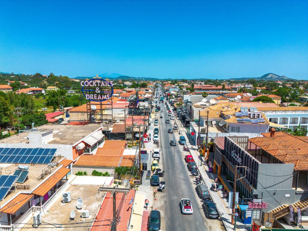 ZAKYNTHOS, GREECE - JUNE 20 2024 Panoramic view over Laganas, Zakynthos. Located on the South coast of Zakynthos island, it is one of the most renowned tourist resorts.