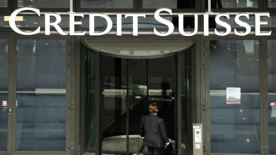 FILE - In this May 12, 2010 file picture a man enters a Credit Suisse bank in Zurich. Credit Suisse Group posted a 79 percent increase in third-quarter profit compared with last year, strong results Thursday, Oct. 24, 2013, that it said reflect the resiliency of its private banking and wealth management. Switzerland's second-largest bank, which has shed thousands of employees in cost-cutting drives to boost profitability, reported a third-quarter profit of 454 million Swiss francs (US dollar 5
