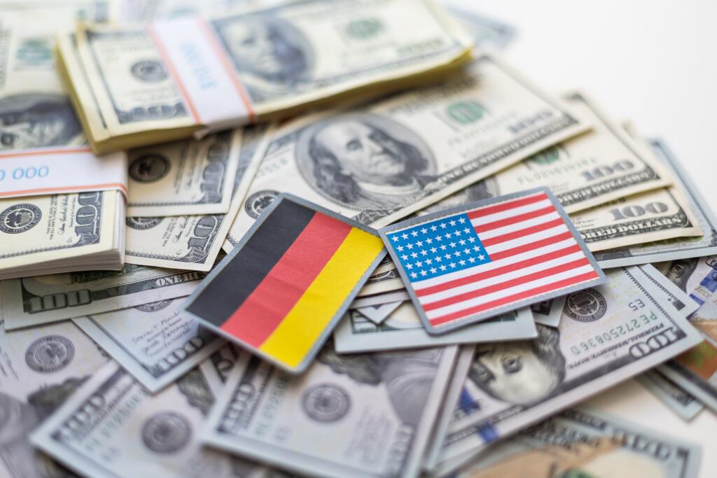 Us,Dollar,Banknote,With,A,German,And,Usa,Flag