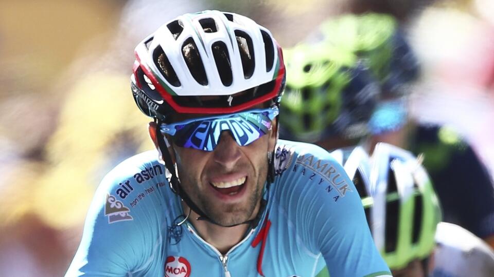 FILE - In this Monday, July 6, 2015 filer,  Italy's Vincenzo Nibali grimaces as he crosses the finish line of the third stage of the Tour de France cycling race over 159.5 kilometers (99.1 miles) with start in Antwerp and finish in Huy, Belgium. The 32-year-old Nibali is aiming to make it a hat trick of victories in his home Grand Tour. Nibali is the only rider in this year's Giro to have won the trophy twice, in 2013 and 2016, and the defending champion has built his season with the sole aim of